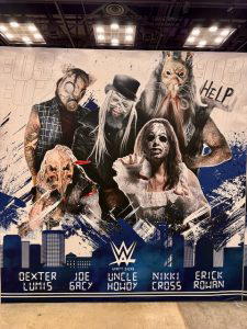 A graphic of The Wyatt Sicks - Dexter Lumis, Joe Gacy, Uncle Howdy, Nikki Cross, and Erick Rowan.