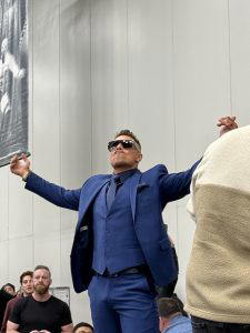 The Miz arrives at the WWE/Fanatics auction table.